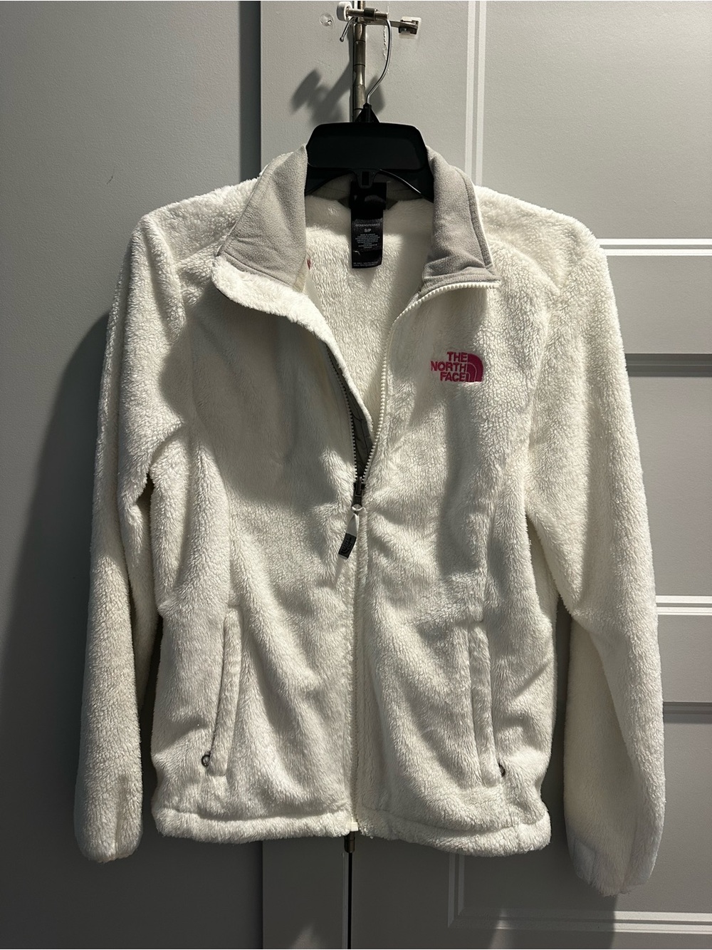 The North Face White Teddy Fleece Jacket with Pink Logo